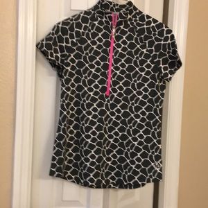 Women size small golfing shirt. Brand is JOFIT
